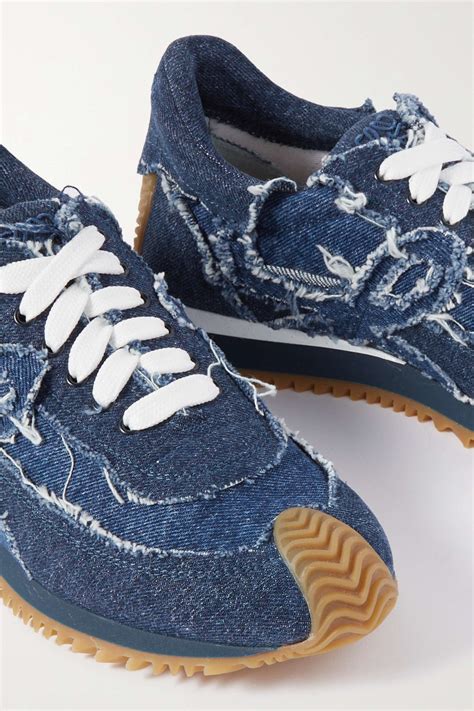 110 denim sneakers.